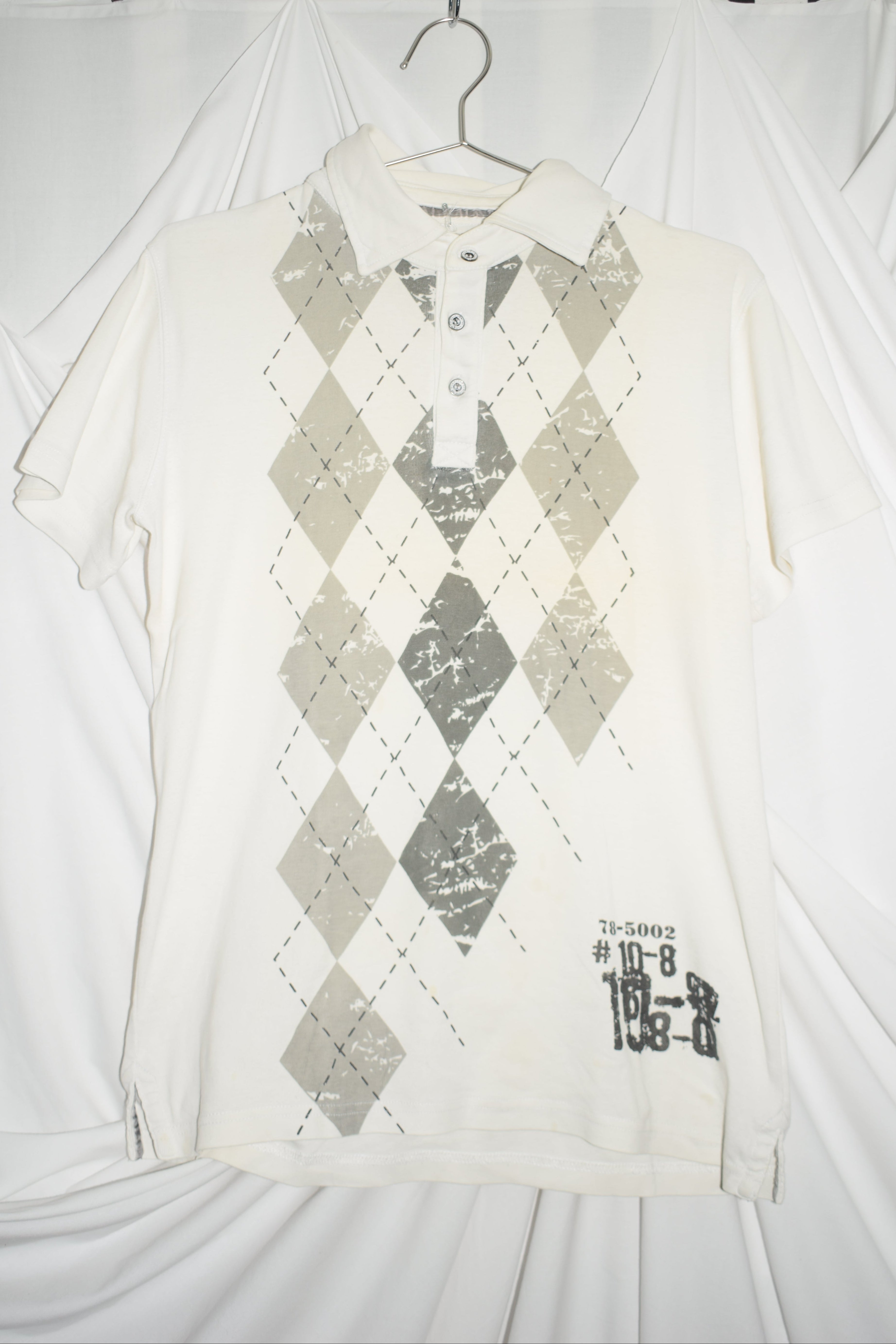 WHITE POLO TOP WITH ARGYLE PRINT