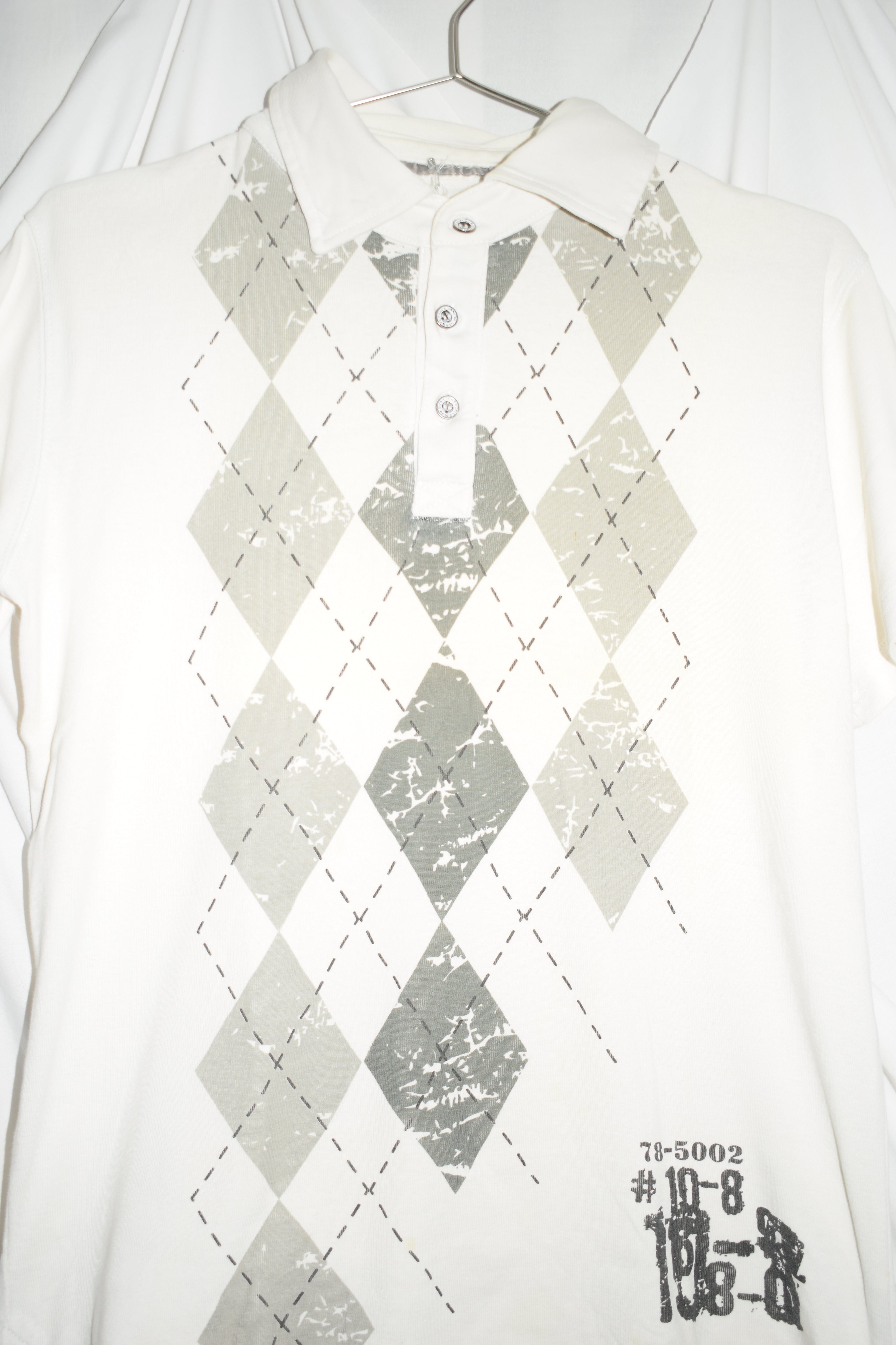WHITE POLO TOP WITH ARGYLE PRINT
