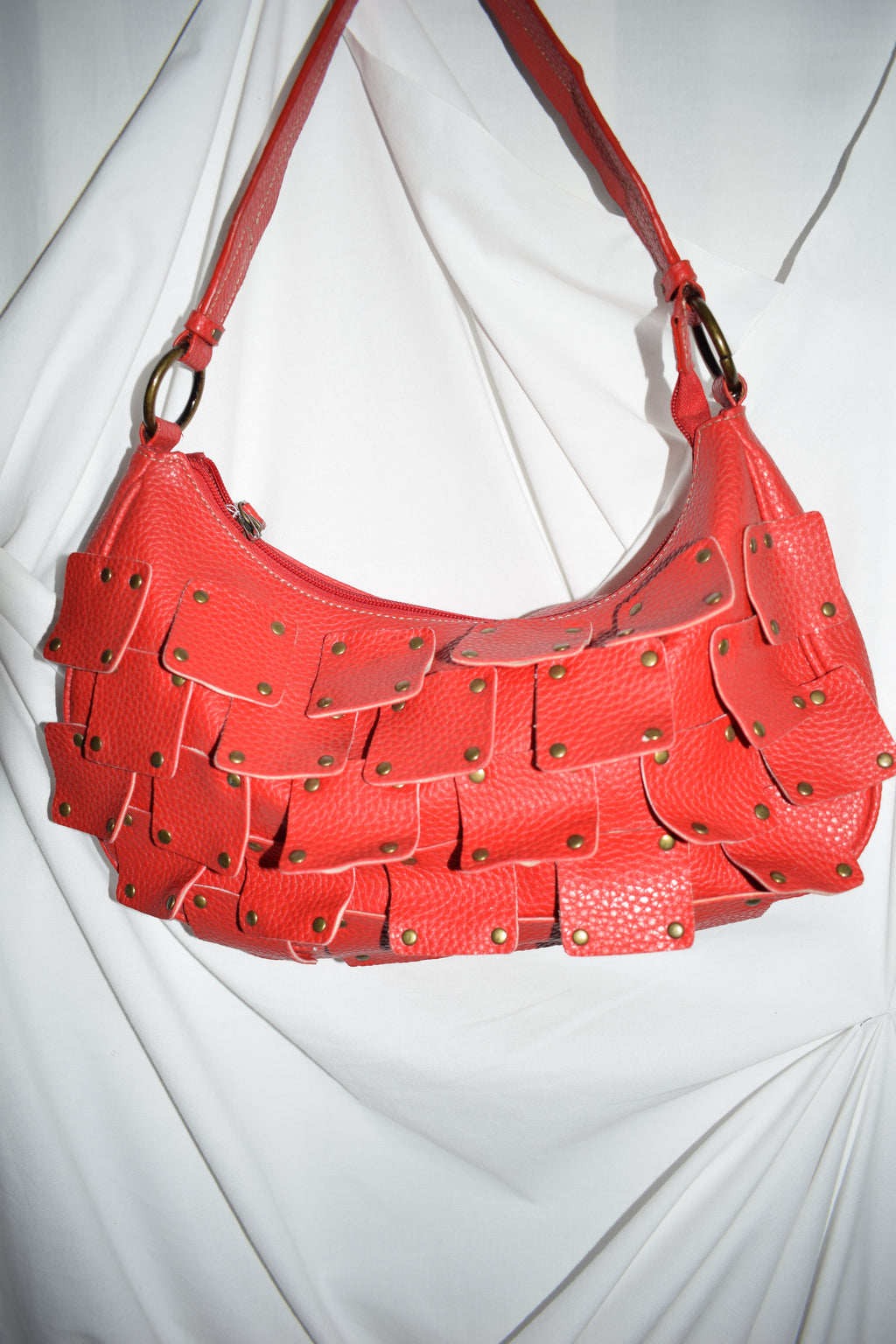 RED SHOULDER BAG WITH STUDS