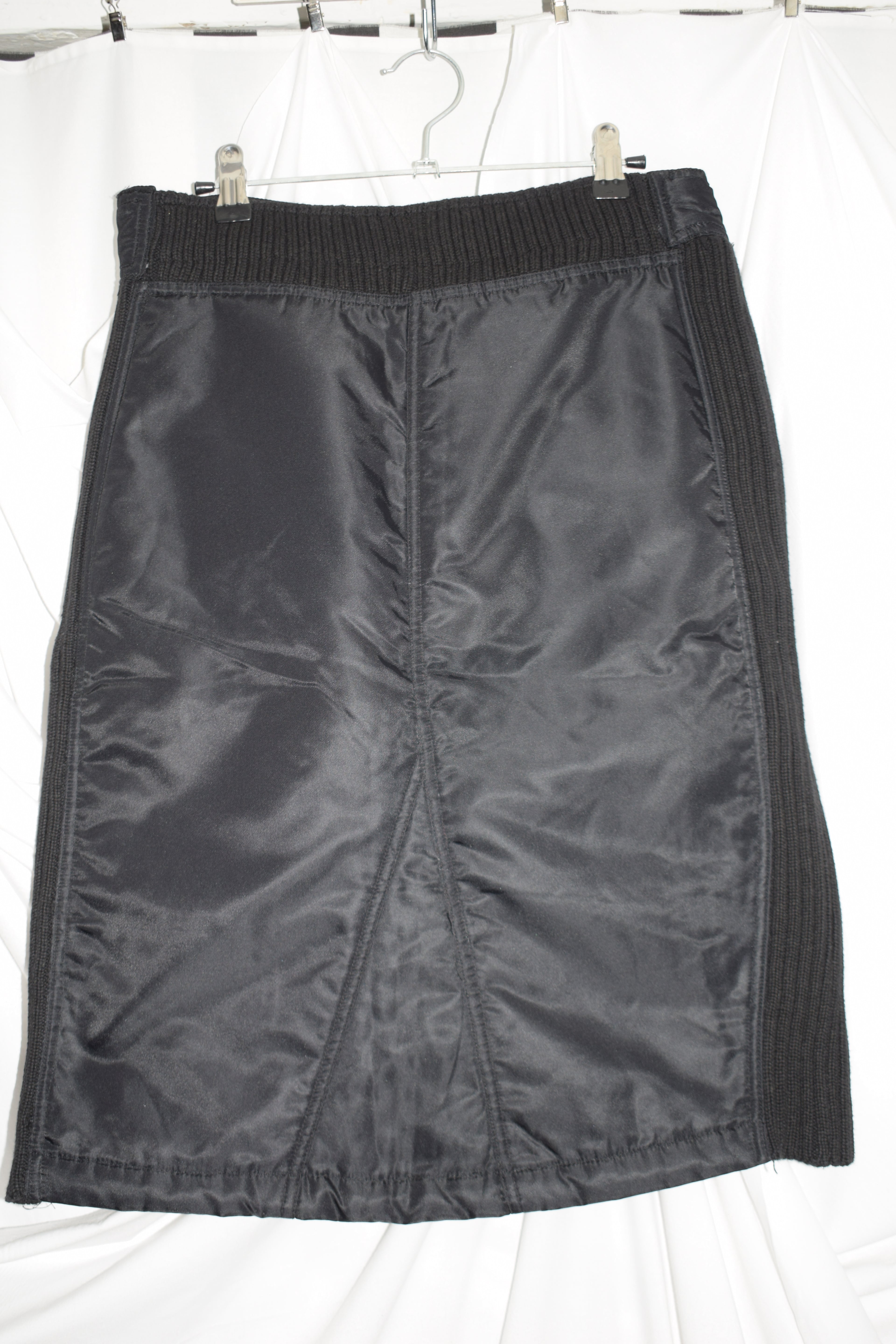 BLACK NYLON MIDI SKIRT WITH KNIT PANELS