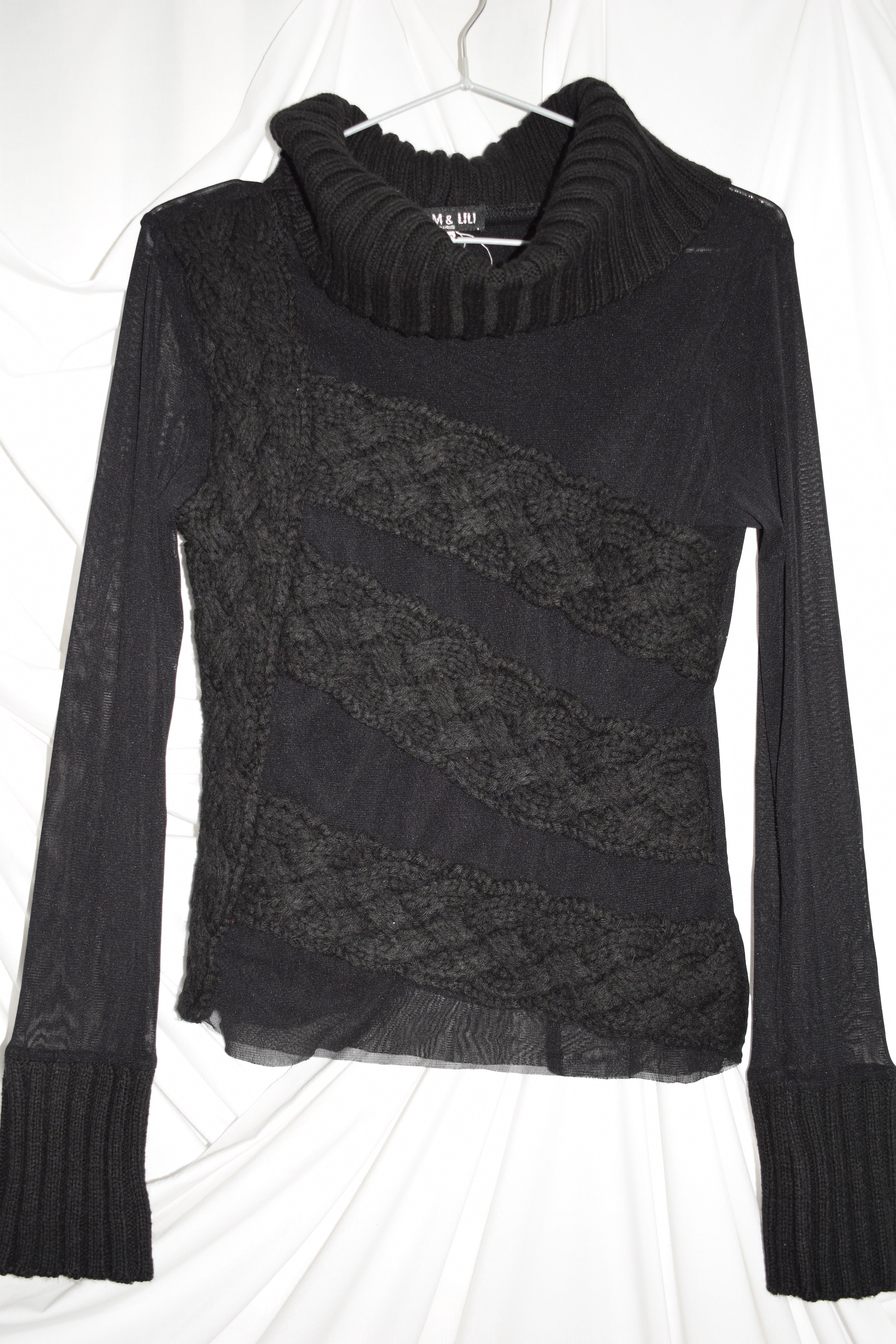 BLACK TURTLE NECK TOP WITH KNIT DETAILS