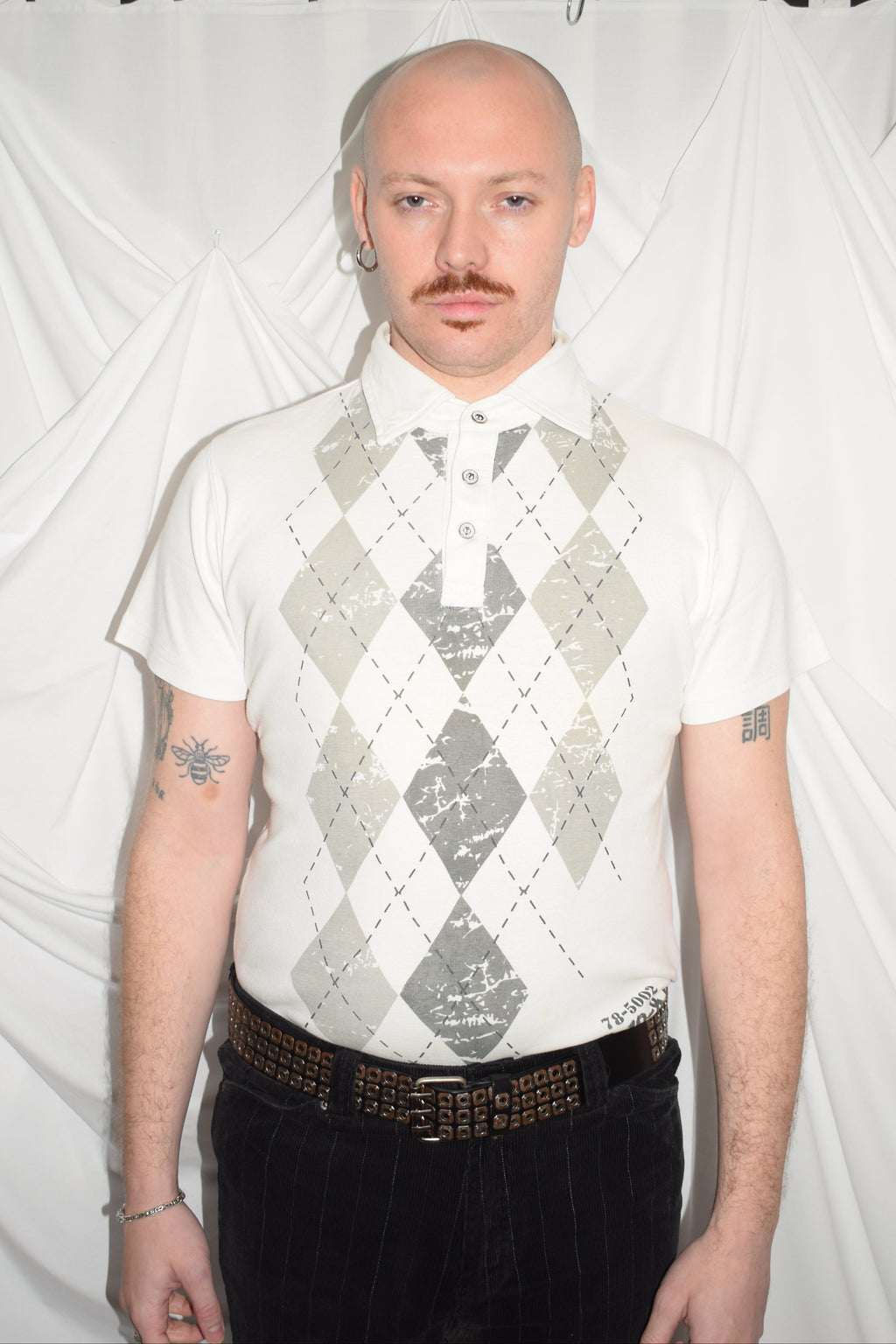 WHITE POLO TOP WITH ARGYLE PRINT